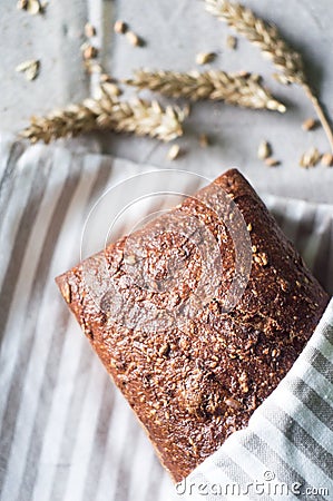 Beautiful Organic Whole Wheat Bread and ears of wheat Stock Photo