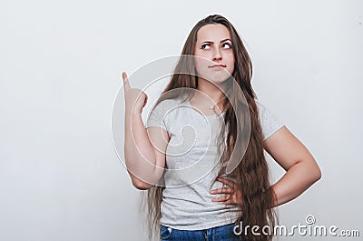 Beautiful overweight girl raised her finger up Stock Photo