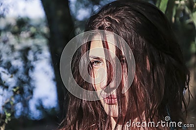 Beautiful Pagan Woman looking at the sunrise, close up Stock Photo