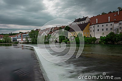 Beautiful panorama of the city of Steyr in upper Austria, rising above the river of Enns on the green river banks. River and small Stock Photo