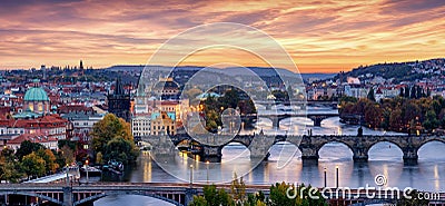 Beautiful panorama of the illuminated cityscape of Prague, Czech Republic, during dusk Stock Photo