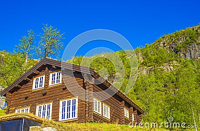 Beautiful panorama Norway Hemsedal Skicenter with Mountains and brown cabin Stock Photo