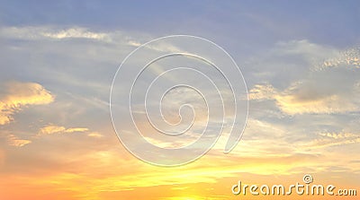 Beautiful panorama of orange and yellow cloudscapes at sunrise/sunset on a blue sky in high resolution Stock Photo