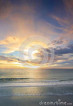 Beautiful of panorama vertical sunset over the clam sea with cloud sky background. Sunset over tropical beach. Nature summer Stock Photo