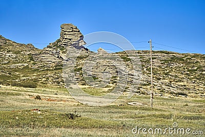 Beautiful panoramic summer steppe landscape of stone mountains Stock Photo