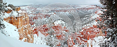 Beautiful panoramic view of Bryce canyon Nationalpark with snow in Winter with red rocks / Utah / USA Stock Photo