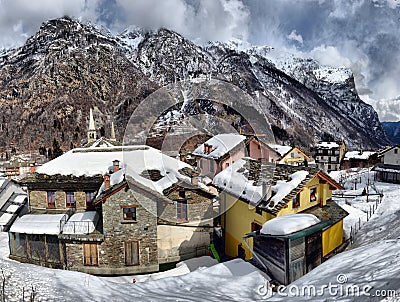 Beautiful panoramic view of historic mountain village on a scenic cold cloudy day Stock Photo