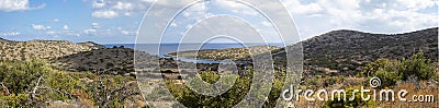 Beautiful panoramic view of the mountains from the bay near the sunken city of Olus, on the island of crete on a sunny day, Stock Photo