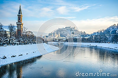 Beautiful panoramic view of Salzburg skyline with Festung Hohensalzburg and river Salzach in winter, Salzburger Land, Austria Stock Photo