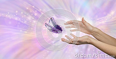 The beautiful peaceful moment of a butterfly being released Stock Photo