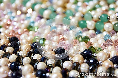 Beautiful pearls. Precious article. Many different colors Stock Photo