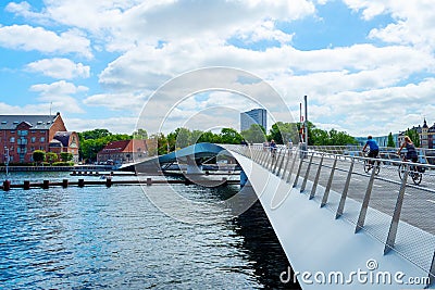 Beautiful pedestrian, bicycle bridge over the canal. Denmark. Copenhagen. Architecture. Sights Editorial Stock Photo