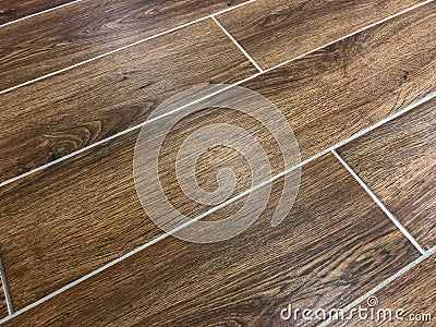 Beautiful perspective shot of the newly installed modern tile floor . Stock Photo