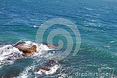 Beautiful petrous bright blue sea beach with huge stones on a summer day, natural landscape photo Stock Photo