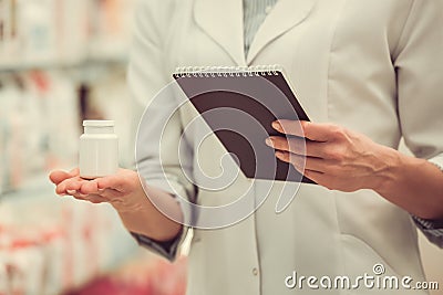 Beautiful pharmacist at work Stock Photo