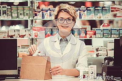 Beautiful pharmacist at work Stock Photo