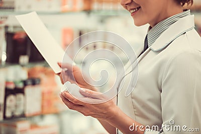 Beautiful pharmacist at work Stock Photo