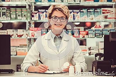 Beautiful pharmacist at work Stock Photo