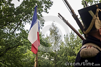 France flag behind the ranks of napoleonic soldiers Stock Photo