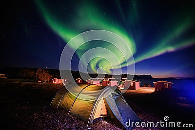 Beautiful picture of massive multicolored green vibrant Aurora Borealis, Aurora Polaris, also know as Northern Lights in Norway Stock Photo