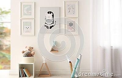 Beautiful pictures in stylish child`s room Stock Photo