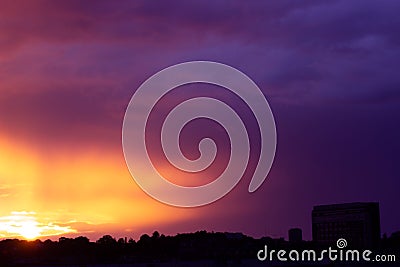 Beautiful summer pink and orange sunset over the city; nature background Stock Photo