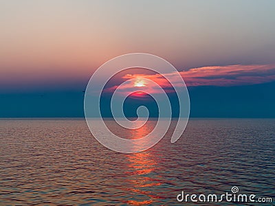 Beautiful pink sunset over the sea - aerial view Stock Photo