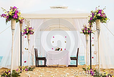 Beautiful place for romantic dinner on the beach Stock Photo