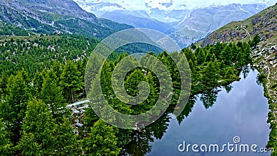 Beautiful places in Switzerland. Lake in the mountains. Untouched nature. The sky in the mountains. Stock Photo