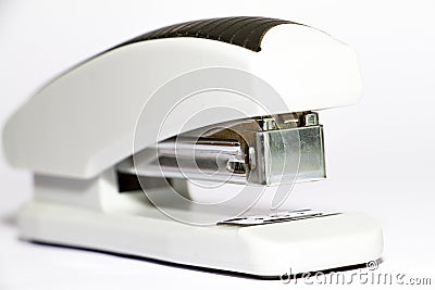 beautiful plastic white stapler on white background Stock Photo