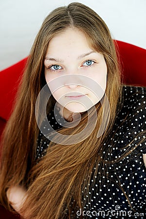 Beautiful plump teen girl with long hair Stock Photo