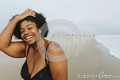 Beautiful plus size African American woman at the beach Stock Photo