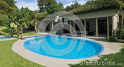 beautiful pool inside a big house Stock Photo