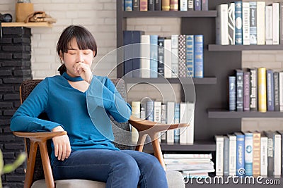 Beautiful portrait young asian woman yawning and tired at home, beauty asia girl expression lazy and bored with cover mouth Stock Photo