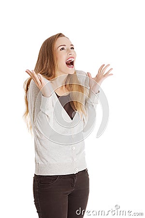 Beautiful positive and casual woman expressing surprise. Stock Photo