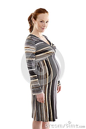 Beautiful pregnant redhead woman fashion Stock Photo