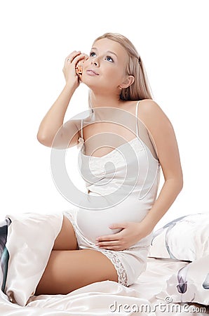 Beautiful pregnant woman with a cockleshell Stock Photo