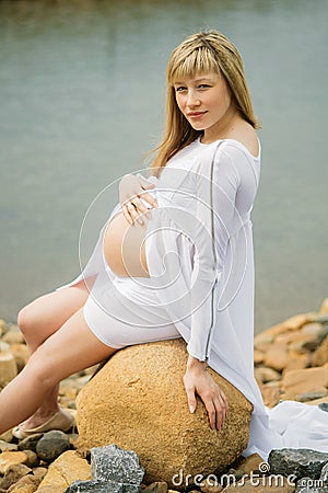 Beautiful pregnant woman outdoor Stock Photo