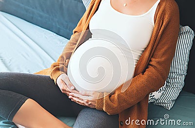 Beautiful pregnant woman waiting of a baby. Stock Photo