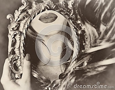 Beautiful pretty young lady woman girl and reflection in the mirror sepia retro vintage Stock Photo