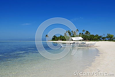 Beautiful Pristine Tropical Island Beach. Stock Photo