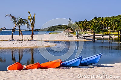 Beautiful ,pristine and Turquoise Maputo beach at Bilene with a lagoon and Indian Ocean meeting Stock Photo