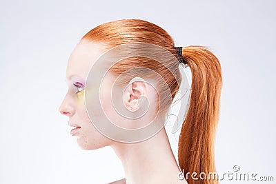 Beautiful profile of red-haired woman Stock Photo