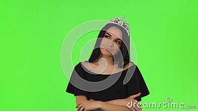 Beautiful prom queen wearing a crown on chromakey background Stock Photo