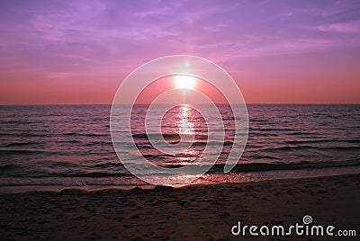 Beautiful purple sunset Burning Skies over the sea Stock Photo