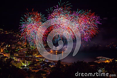 Beautiful and pyrotechnic fireworks in Recco, Italy / Fireworks in Recco, Genoa, Italy Stock Photo