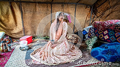 Beautiful Qashqai nomadic woman inside her tent, Shiraz, Iran Editorial Stock Photo