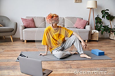 beautiful queer person in yellow t Stock Photo