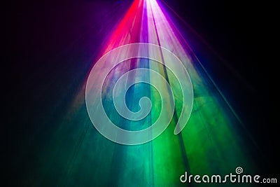 Beautiful rainbow color wide lens projector with light beam for movie and cinema at night . smoke texture spotlight , screening Stock Photo