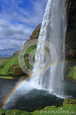 Beautiful Rainbow at Seljalandsfoss Waterfall, South Coast of Iceland Stock Photo